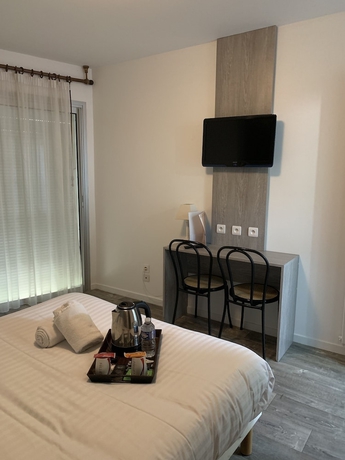 Imagen de la habitación del Hotel Relais Des Lilas. Foto 9