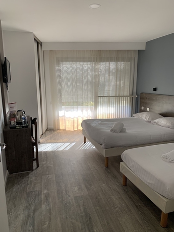 Imagen de la habitación del Hotel Relais Des Lilas. Foto 10