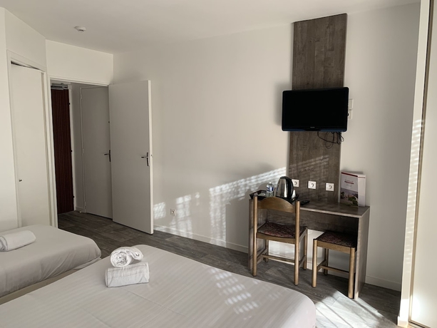 Imagen de la habitación del Hotel Relais Des Lilas. Foto 12