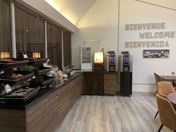 Imagen del bar/restaurante del Hotel Relais Des Lilas. Foto 2