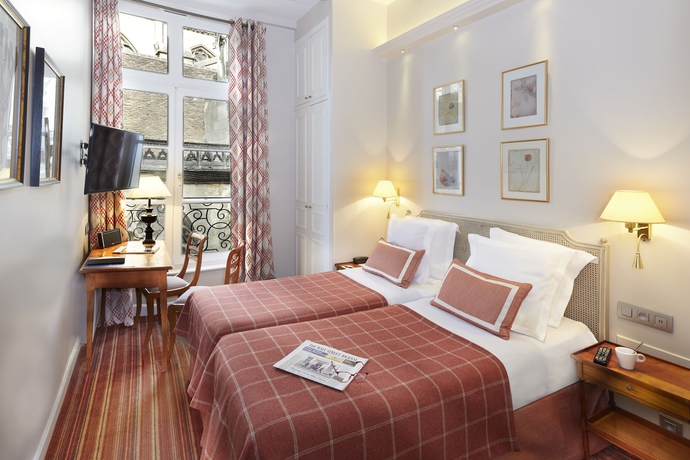 Imagen de la habitación del Hotel Relais Du Louvre. Foto 10