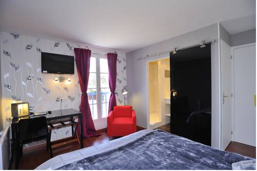 Imagen de la habitación del Hotel Relais Du Silence Aux Maisons. Foto 10
