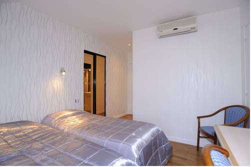 Imagen de la habitación del Hotel Relais Du Silence Aux Maisons. Foto 16