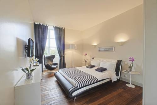 Imagen de la habitación del Hotel Relais Du Silence Château Du Bois Guy. Foto 14