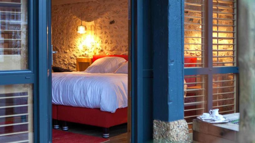 Imagen de la habitación del Hotel Relais Du Silence Le Jardin Des Plumes. Foto 4