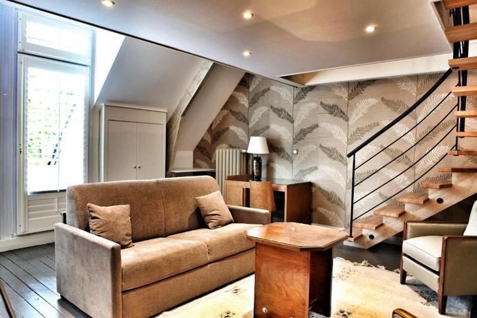 Imagen de la habitación del Hotel Relais Du Silence Le Jardin Des Plumes. Foto 5