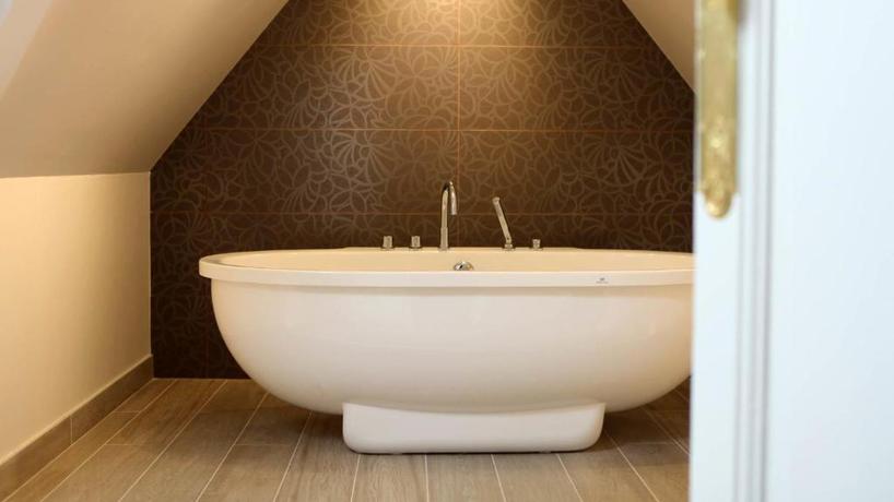 Imagen de la habitación del Hotel Relais Du Silence Le Jardin Des Plumes. Foto 6