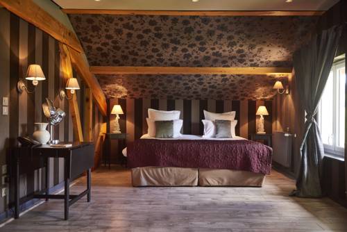 Imagen de la habitación del Hotel Relais Du Silence Le Manoir Des Montagnes. Foto 6