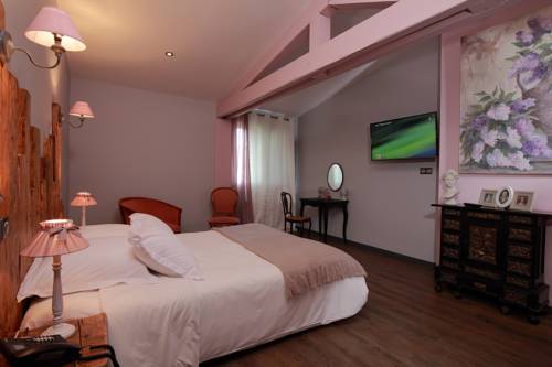Imagen de la habitación del Hotel Relais Du Silence Le Manoir Des Montagnes. Foto 9