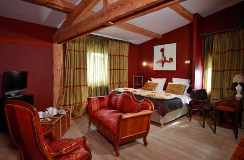 Imagen de la habitación del Hotel Relais Du Silence Le Manoir Des Montagnes. Foto 10
