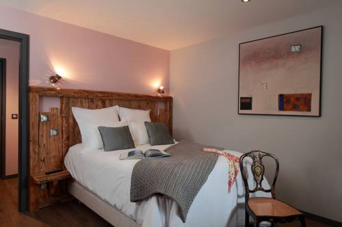 Imagen de la habitación del Hotel Relais Du Silence Le Manoir Des Montagnes. Foto 11