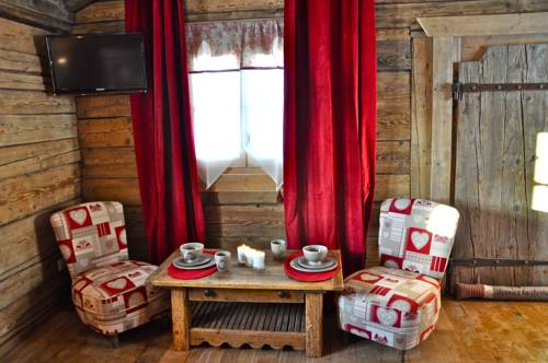 Imagen de la habitación del Hotel Relais Du Silence Le Manoir Des Montagnes. Foto 13