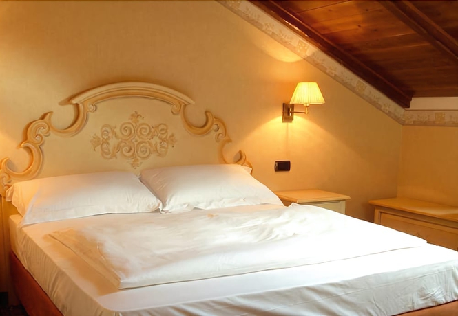 Imagen de la habitación del Hotel Relais Ducale Spa and Pool. Foto 11