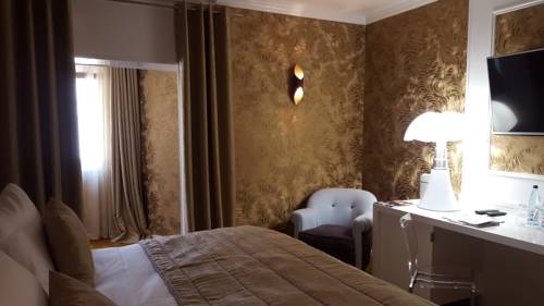 Imagen de la habitación del Hotel Relais Et Ch&acirc;teaux Le Chambard. Foto 5