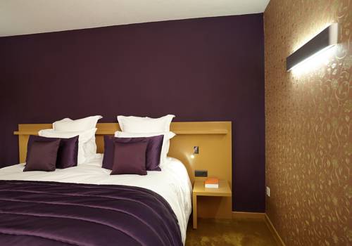 Imagen de la habitación del Hotel Relais Et Ch&acirc;teaux Le Chambard. Foto 6
