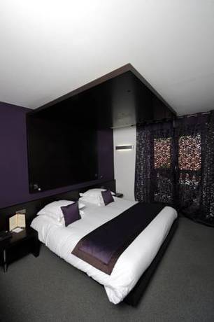 Imagen de la habitación del Hotel Relais Et Ch&acirc;teaux Le Chambard. Foto 10
