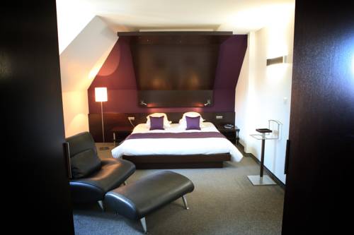 Imagen de la habitación del Hotel Relais Et Ch&acirc;teaux Le Chambard. Foto 12