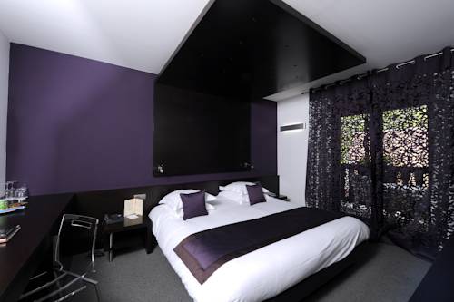 Imagen de la habitación del Hotel Relais Et Ch&acirc;teaux Le Chambard. Foto 13