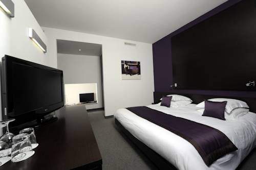 Imagen de la habitación del Hotel Relais Et Ch&acirc;teaux Le Chambard. Foto 14