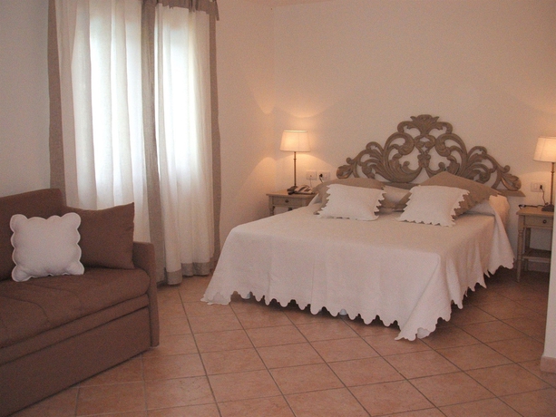 Imagen de la habitación del Hotel Relais Fenicottero Rosa. Foto 2