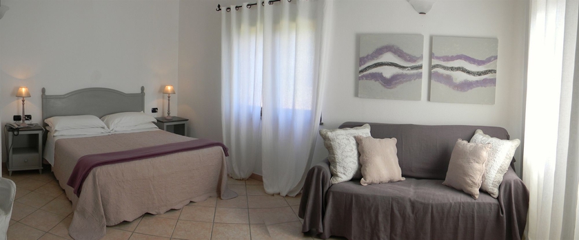 Imagen de la habitación del Hotel Relais Fenicottero Rosa. Foto 4