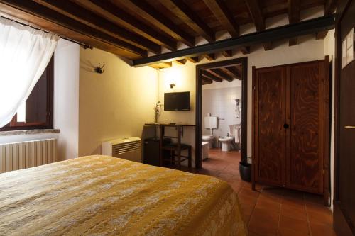 Imagen de la habitación del Hotel Relais Fontevivo. Foto 5