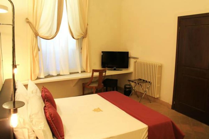 Imagen de la habitación del Hotel Relais Giulia. Foto 8