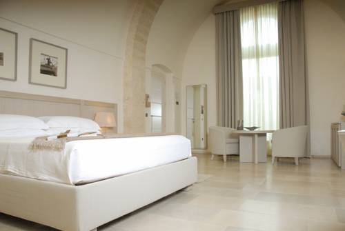 Imagen de la habitación del Hotel Relais Histò San Pietro Sul Mar Piccolo. Foto 12