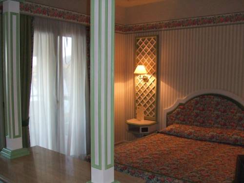 Imagen de la habitación del Hotel Relais I Presidi. Foto 15