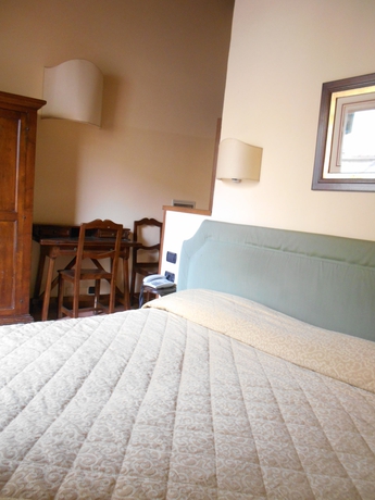 Imagen de la habitación del Hotel Relais Il Cestello. Foto 12