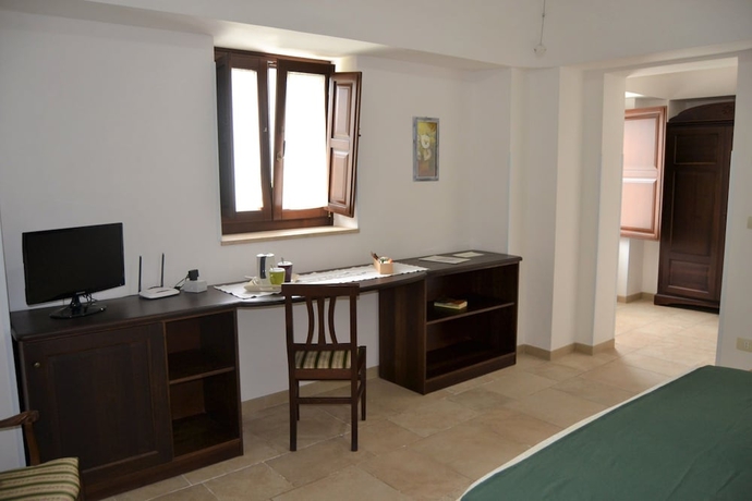 Imagen de la habitación del Hotel Relais Il Palmento. Foto 13