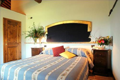 Imagen de la habitación del Hotel Relais La Chiusa. Foto 5