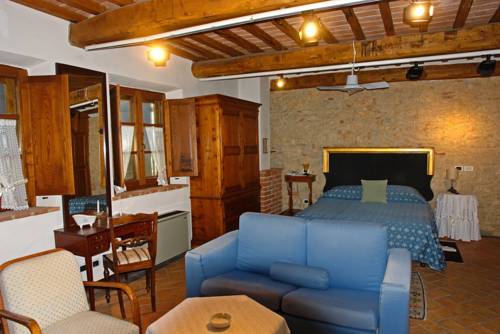 Imagen de la habitación del Hotel Relais La Chiusa. Foto 6