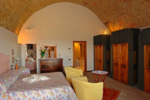 Imagen de la habitación del Hotel Relais La Chiusa. Foto 8