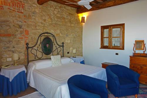 Imagen de la habitación del Hotel Relais La Chiusa. Foto 9