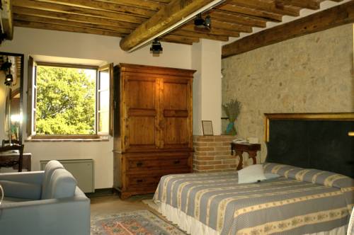 Imagen de la habitación del Hotel Relais La Chiusa. Foto 12