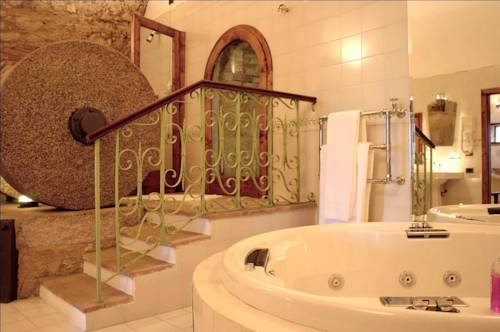 Imagen de la habitación del Hotel Relais La Chiusa. Foto 13