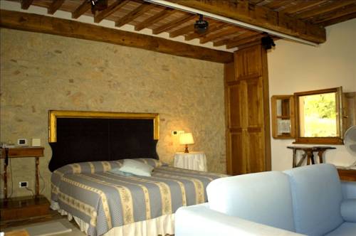 Imagen de la habitación del Hotel Relais La Chiusa. Foto 16