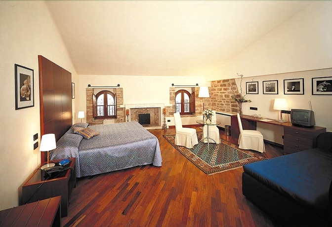 Imagen de la habitación del Hotel Relais La Corte Di Bettona. Foto 5