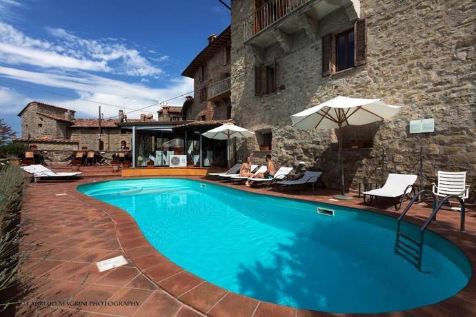 Imagen de la piscina del Hotel Relais La Fattoria, Passignano Sul Trasimeno. Foto 18