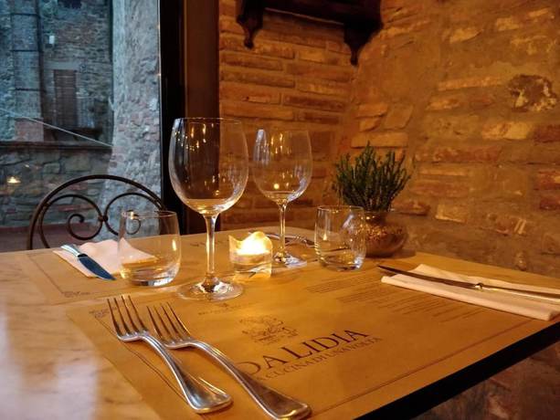 Imagen del bar/restaurante del Hotel Relais La Fattoria, Passignano Sul Trasimeno. Foto 6