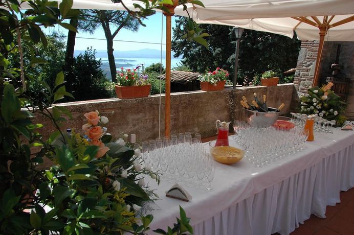 Imagen de la habitación del Hotel Relais La Fattoria, Passignano Sul Trasimeno. Foto 14