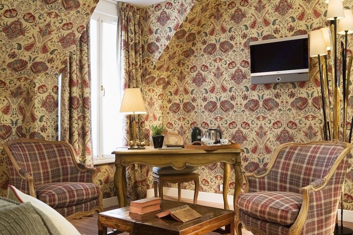 Imagen de la habitación del Hotel Relais Madeleine. Foto 3