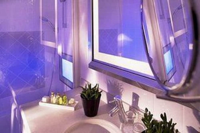 Imagen de la habitación del Hotel Relais Madeleine. Foto 16