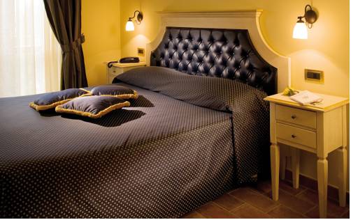 Imagen de la habitación del Hotel Relais Madonna Di Campagna. Foto 4