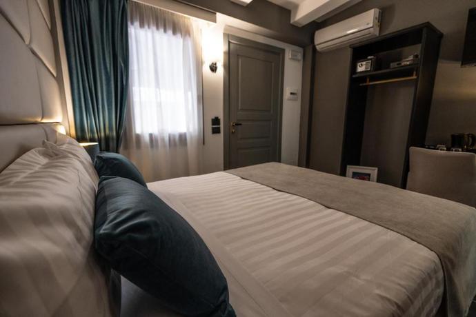 Imagen de la habitación del Hotel Relais Manzoni. Foto 7