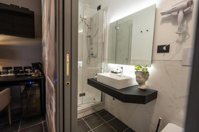 Imagen de la habitación del Hotel Relais Manzoni. Foto 8