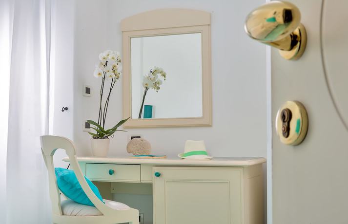 Imagen de la habitación del Hotel Relais Maresca Luxury Small. Foto 5