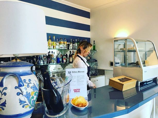 Imagen del bar/restaurante del Hotel Relais Maresca Luxury Small. Foto 3