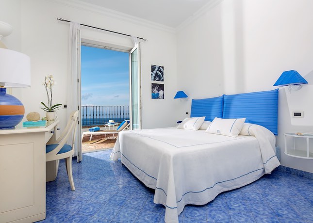 Imagen de la habitación del Hotel Relais Maresca Luxury Small. Foto 11